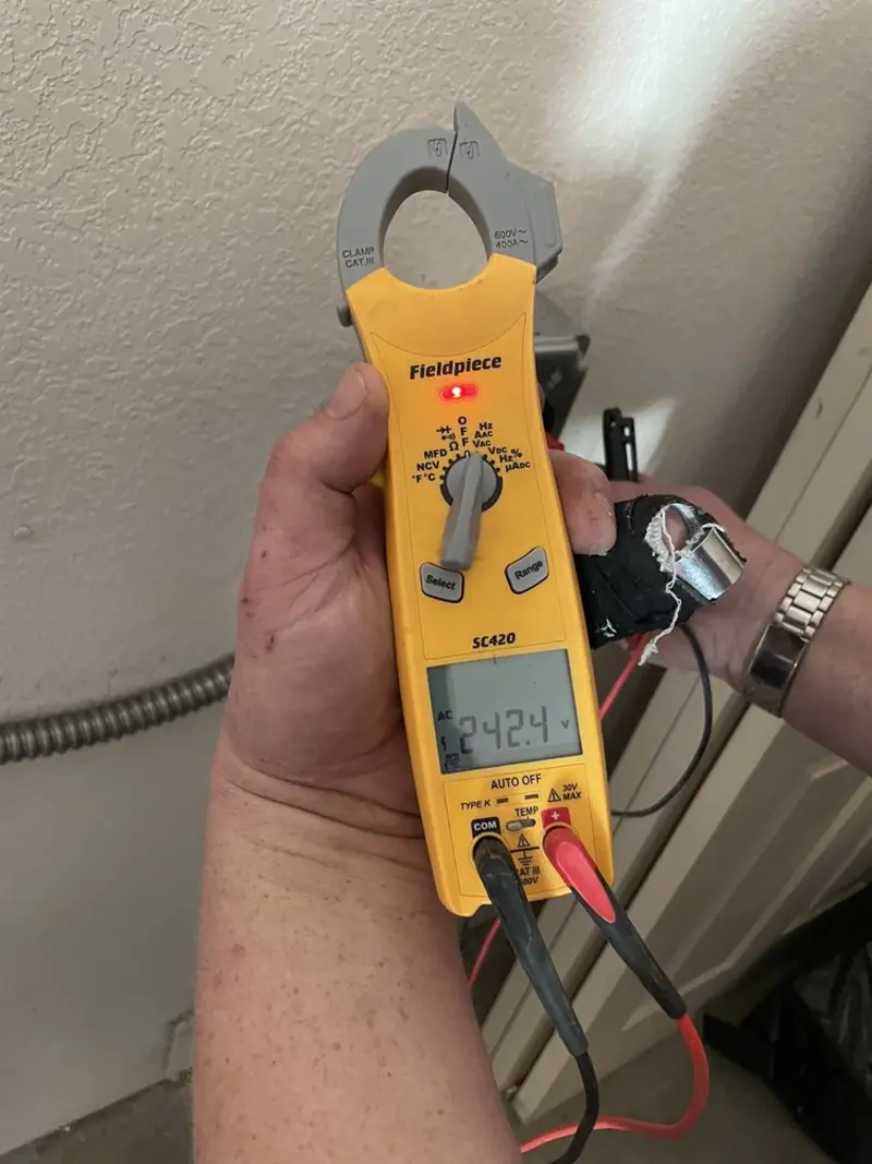 Voltage testing with clamp meter during Hot Tub / Pool Electrical Wiring in Sunset